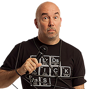 Photo of Dr,. Pete performing stand-up comedy.